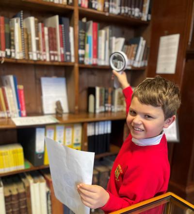 George Foote looks for historical clues with his magnifying glass!