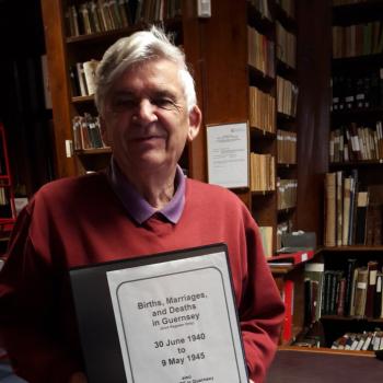 Priaulx Library customer and local history researcher Arthur Le Page with the Occupation BMD Indexes