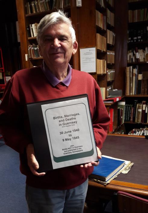 Priaulx Library customer and local history researcher Arthur Le Page with the Occupation BMD Indexes