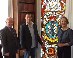 Air-Marshal Sir Peter Walker, Jurat Claire Le Pelley and Lee Stillwell of Bonsai admire the window in situ.