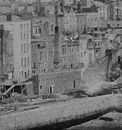 A cement mill on the site of the present Albert Statue, detail from the 1857 panoramic view by Garnier (see above)