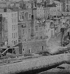 A cement mill on the site of the present Albert Statue, detail from the 1857 panoramic view by Garnier (see above)